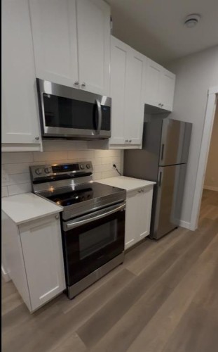 311 Wolf Creek Way Se, Calgary, AB - Indoor Photo Showing Kitchen