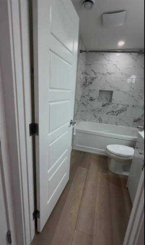 311 Wolf Creek Way Se, Calgary, AB - Indoor Photo Showing Bathroom