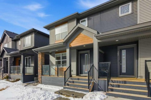 311 Wolf Creek Way Se, Calgary, AB - Outdoor With Facade