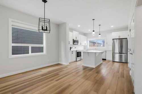 311 Wolf Creek Way Se, Calgary, AB - Indoor Photo Showing Kitchen With Stainless Steel Kitchen With Upgraded Kitchen