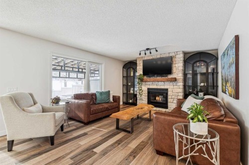 179 Mt Copper Park Se, Calgary, AB - Indoor Photo Showing Living Room With Fireplace