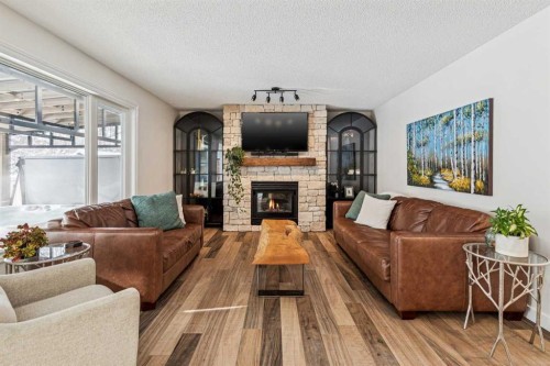 179 Mt Copper Park Se, Calgary, AB - Indoor Photo Showing Living Room With Fireplace