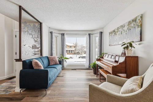 179 Mt Copper Park Se, Calgary, AB - Indoor Photo Showing Living Room