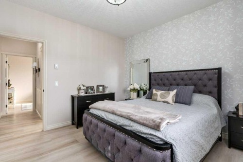 401 Sunvale Crescent Ne, High River, AB - Indoor Photo Showing Bedroom