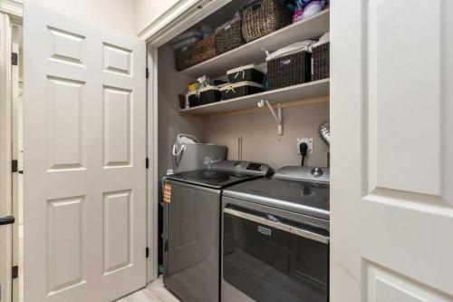 401 Sunvale Crescent Ne, High River, AB - Indoor Photo Showing Laundry Room