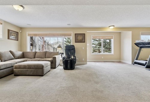 212 Springmere Place, Chestermere, AB - Indoor Photo Showing Living Room