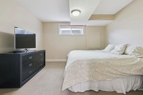 212 Springmere Place, Chestermere, AB - Indoor Photo Showing Bedroom