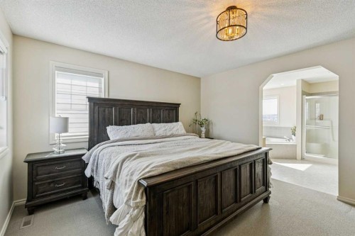 120 Hidden Creek Circle Nw, Calgary, AB - Indoor Photo Showing Bedroom
