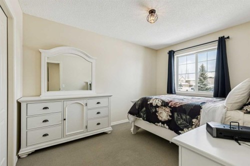 120 Hidden Creek Circle Nw, Calgary, AB - Indoor Photo Showing Bedroom
