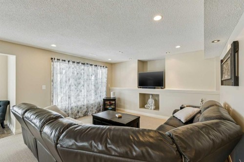 120 Hidden Creek Circle Nw, Calgary, AB - Indoor Photo Showing Living Room