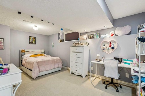 120 Hidden Creek Circle Nw, Calgary, AB - Indoor Photo Showing Bedroom
