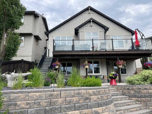 120 Hidden Creek Circle Nw, Calgary, AB - Outdoor With Deck Patio Veranda With Facade