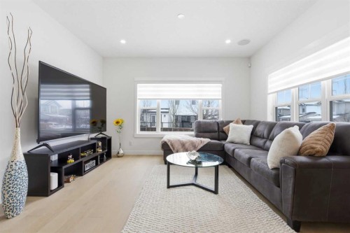 103 Oakmere Green, Chestermere, AB - Indoor Photo Showing Living Room