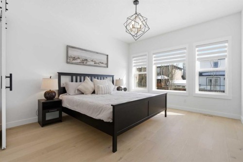 103 Oakmere Green, Chestermere, AB - Indoor Photo Showing Bedroom