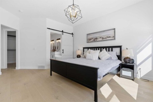 103 Oakmere Green, Chestermere, AB - Indoor Photo Showing Bedroom