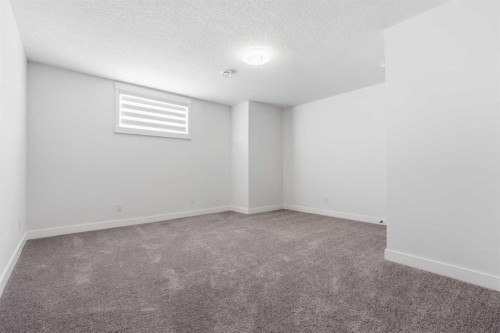 103 Oakmere Green, Chestermere, AB - Indoor Photo Showing Other Room