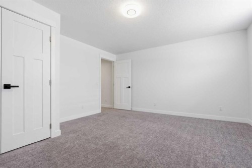 103 Oakmere Green, Chestermere, AB - Indoor Photo Showing Other Room
