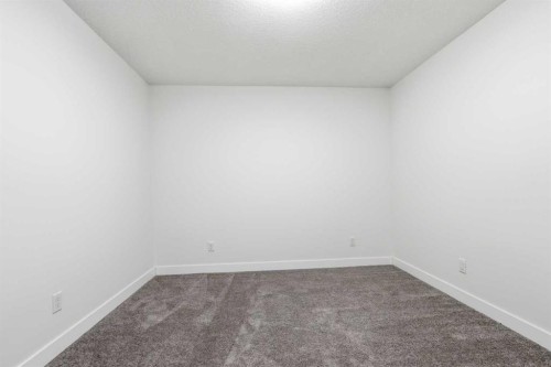 103 Oakmere Green, Chestermere, AB - Indoor Photo Showing Other Room