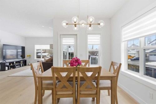 103 Oakmere Green, Chestermere, AB - Indoor Photo Showing Dining Room