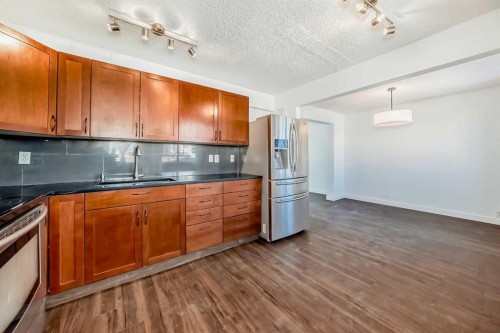 60 Erin Mount Crescent Se, Calgary, AB - Indoor Photo Showing Kitchen