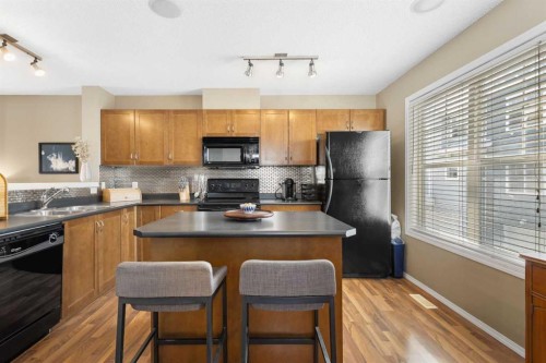 241 Elgin Gardens Se, Calgary, AB - Indoor Photo Showing Kitchen With Double Sink