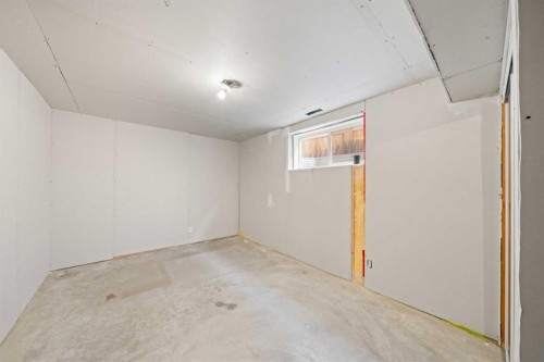 145 Cimarron Grove Circle, Okotoks, AB - Indoor Photo Showing Other Room