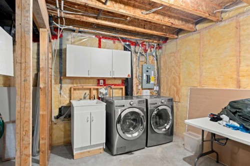145 Cimarron Grove Circle, Okotoks, AB - Indoor Photo Showing Laundry Room