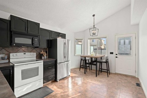 145 Cimarron Grove Circle, Okotoks, AB - Indoor Photo Showing Kitchen