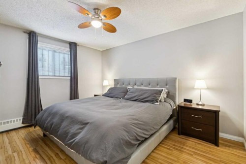 102-21 Dover Point Se, Calgary, AB - Indoor Photo Showing Bedroom