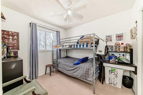 155 Erin Meadow Way Se, Calgary, AB - Indoor Photo Showing Bedroom