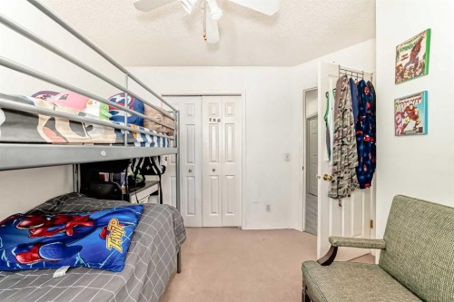 155 Erin Meadow Way Se, Calgary, AB - Indoor Photo Showing Bedroom