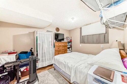 155 Erin Meadow Way Se, Calgary, AB - Indoor Photo Showing Bedroom