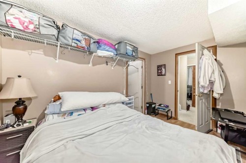 155 Erin Meadow Way Se, Calgary, AB - Indoor Photo Showing Bedroom