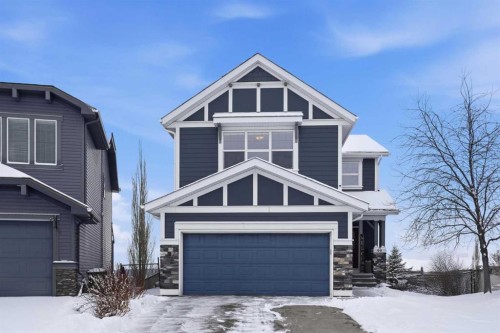 99 Sunset View, Cochrane, AB - Outdoor With Facade