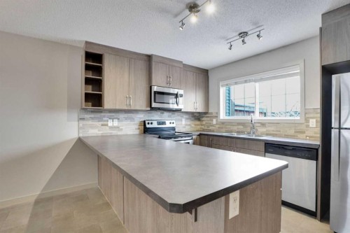 422 Legacy Village Way Se, Calgary, AB - Indoor Photo Showing Kitchen With Stainless Steel Kitchen With Double Sink