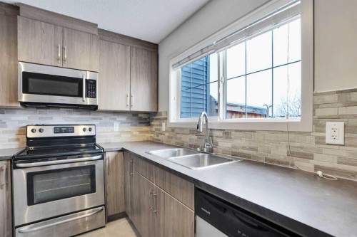 422 Legacy Village Way Se, Calgary, AB - Indoor Photo Showing Kitchen With Stainless Steel Kitchen With Double Sink