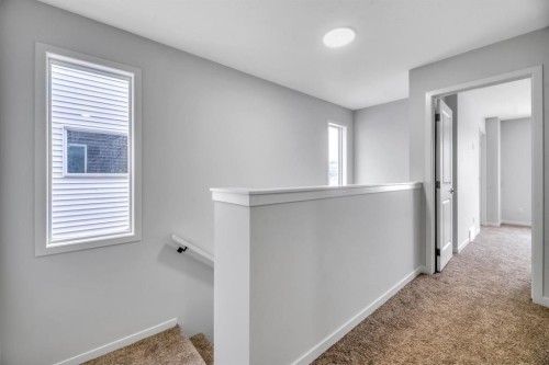 220 Annette Villas Nw, Calgary, AB - Indoor Photo Showing Other Room