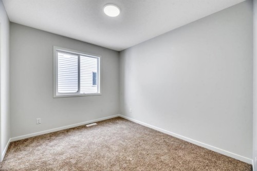 220 Annette Villas Nw, Calgary, AB - Indoor Photo Showing Other Room