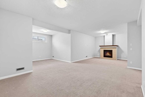 38 Silverado Skies Crescent, Calgary, AB - Indoor With Fireplace