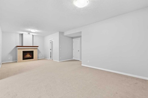 38 Silverado Skies Crescent, Calgary, AB - Indoor With Fireplace