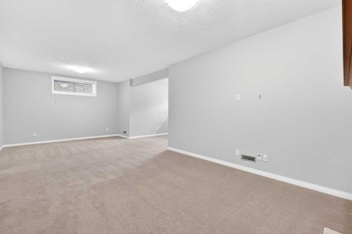 38 Silverado Skies Crescent, Calgary, AB - Indoor Photo Showing Other Room