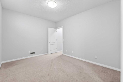 38 Silverado Skies Crescent, Calgary, AB - Indoor Photo Showing Other Room