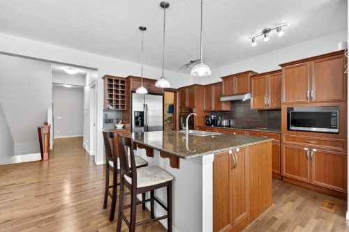 38 Silverado Skies Crescent, Calgary, AB - Indoor Photo Showing Kitchen With Double Sink