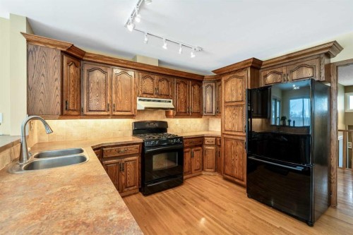 3316 24 Street Nw, Calgary, AB - Indoor Photo Showing Kitchen With Double Sink