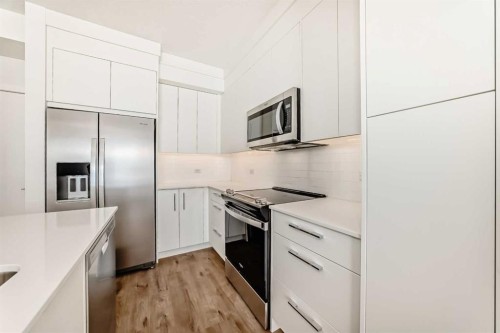 2309-63 Corner Glen Crescent Ne, Calgary, AB - Indoor Photo Showing Kitchen With Stainless Steel Kitchen With Upgraded Kitchen