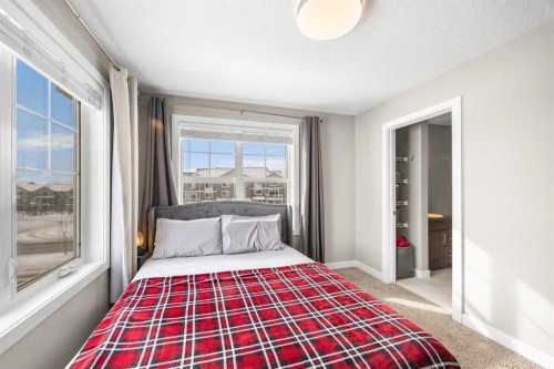 111 Evanscrest Gardens Nw, Calgary, AB - Indoor Photo Showing Bedroom
