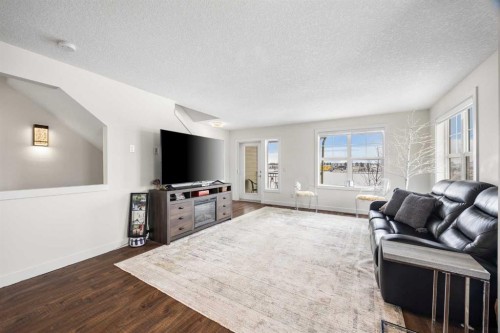 111 Evanscrest Gardens Nw, Calgary, AB - Indoor Photo Showing Living Room