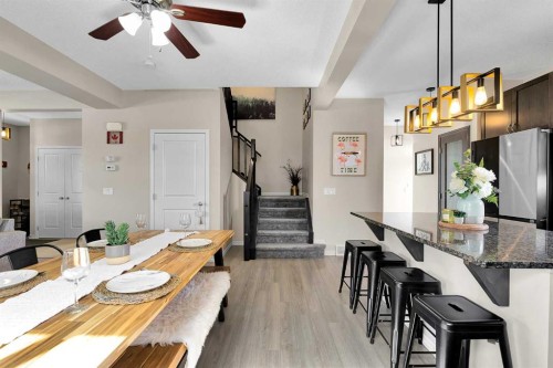 151 Heritage Drive, Cochrane, AB - Indoor Photo Showing Dining Room