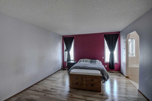 606 Diamond Court Se, Calgary, AB - Indoor Photo Showing Bedroom