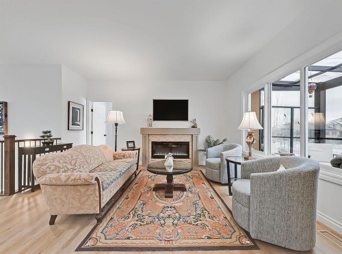 1627 Montrose Terrace Se, High River, AB - Indoor Photo Showing Living Room With Fireplace